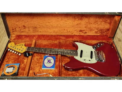 1966 FENDER Mustang 144551 Offset Contour Body. Guitar All Original: 1966 FENDER Mustang 144551 Offset Contour Body Guitar All Original. Dimensions: H: 39.5 inches: W: 10 inches: D: 2 inches. // Provenance: PRIVATE ESTATE CENTRAL FLORIDA. Please carefully read our term