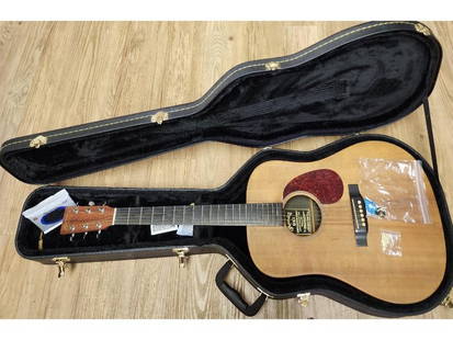 A Vintage Martin & Co Acoustic Guitar DX1 With Case 40 3/4": A Vintage Martin & Co Acoustic Guitar DX1 With Case 40 3/4". // Provenance: PRIVATE ESTATE CENTRAL FLORIDA. C.F. Martin & Co. (often referred to as Martin) is an American guitar manufacturer establish