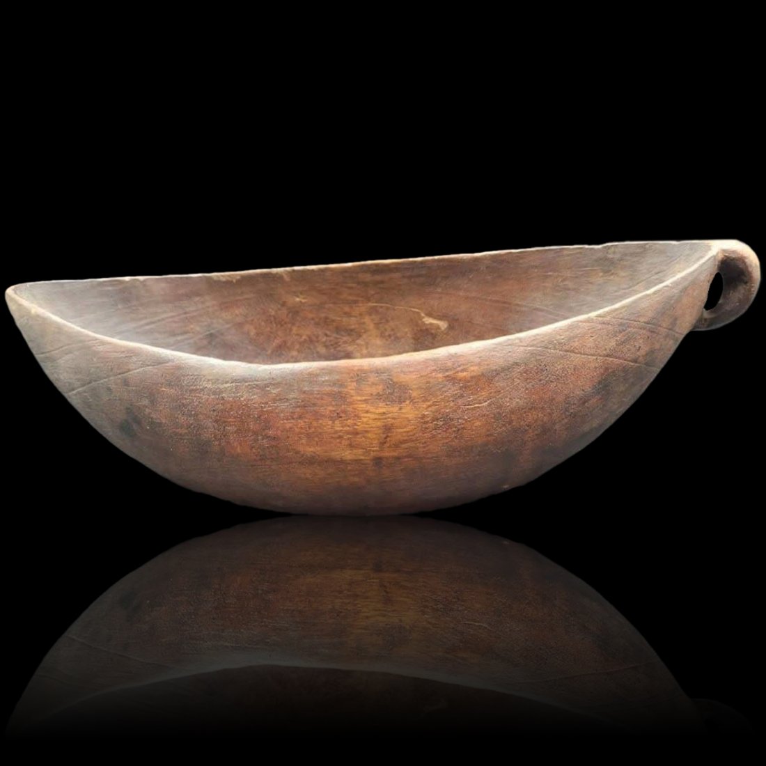 Papua New Guinea Carved Bowl, NO RESERVES: Papua New Guinea Carved Bowl. Probably for sago consumption, this hand carved bowl measures approximately 3.75" X 12" X 6". It was collected, and cataloged in the mid-1970s by an American expat living