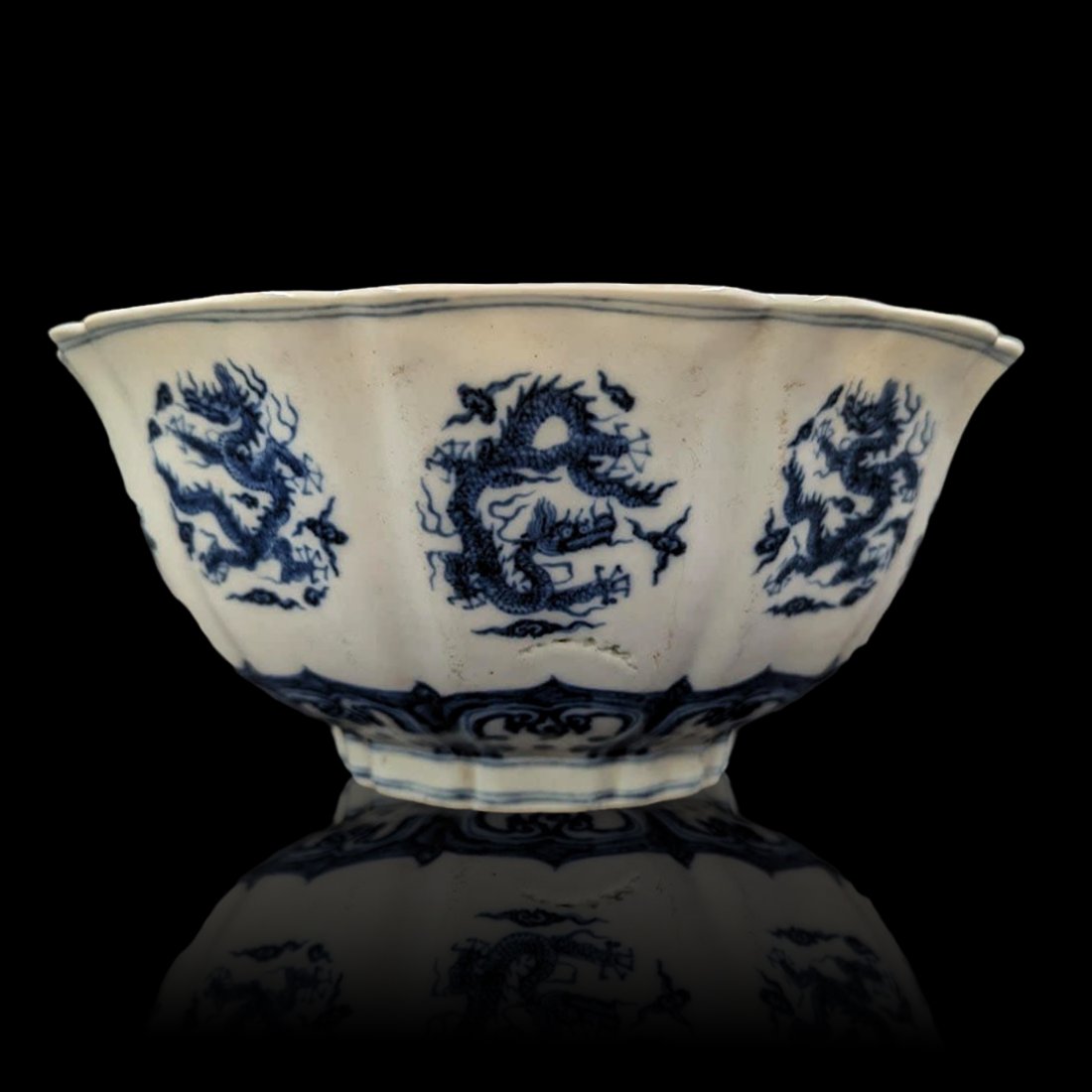Chinese Blue And White Porcelain Bowl With Six Character Mark, Decorated With Dragons: Chinese Blue And White Porcelain Bowl With Six Character Mark, Decorated With Dragons. Measures approx. 3 1/2" tall and 7 1/2" in diameter. || Please carefully read our terms of sale, shipping informa