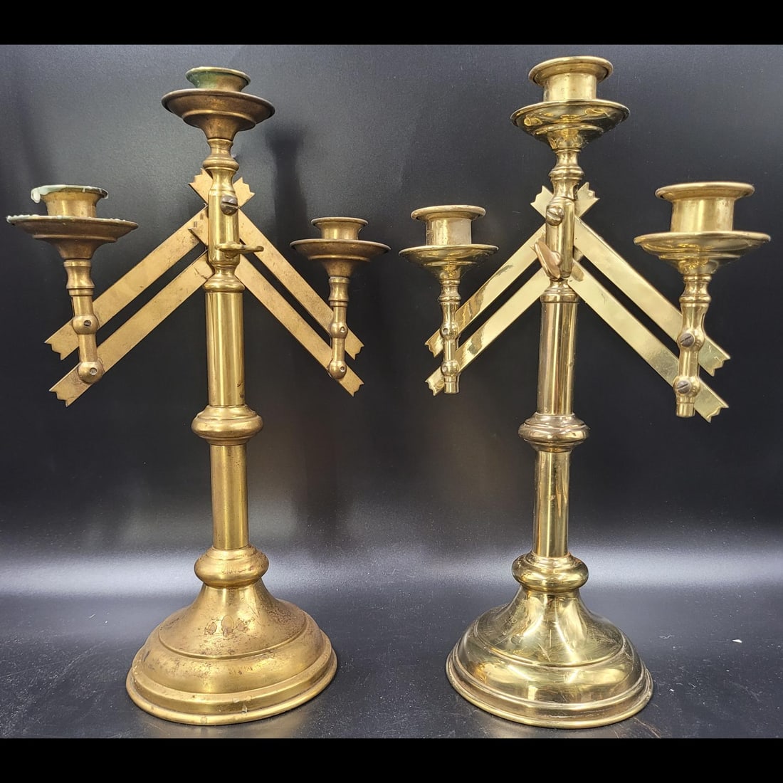 Pair Of Church Gilt Bronze Adjustable Candelabras With 3 Holders: Pair Of Church Gilt Bronze Adjustable Candelabras. Candelabras measure approx. 15" X 10" each. || Please carefully read our terms of sale, shipping information, and request any condition reports or ph
