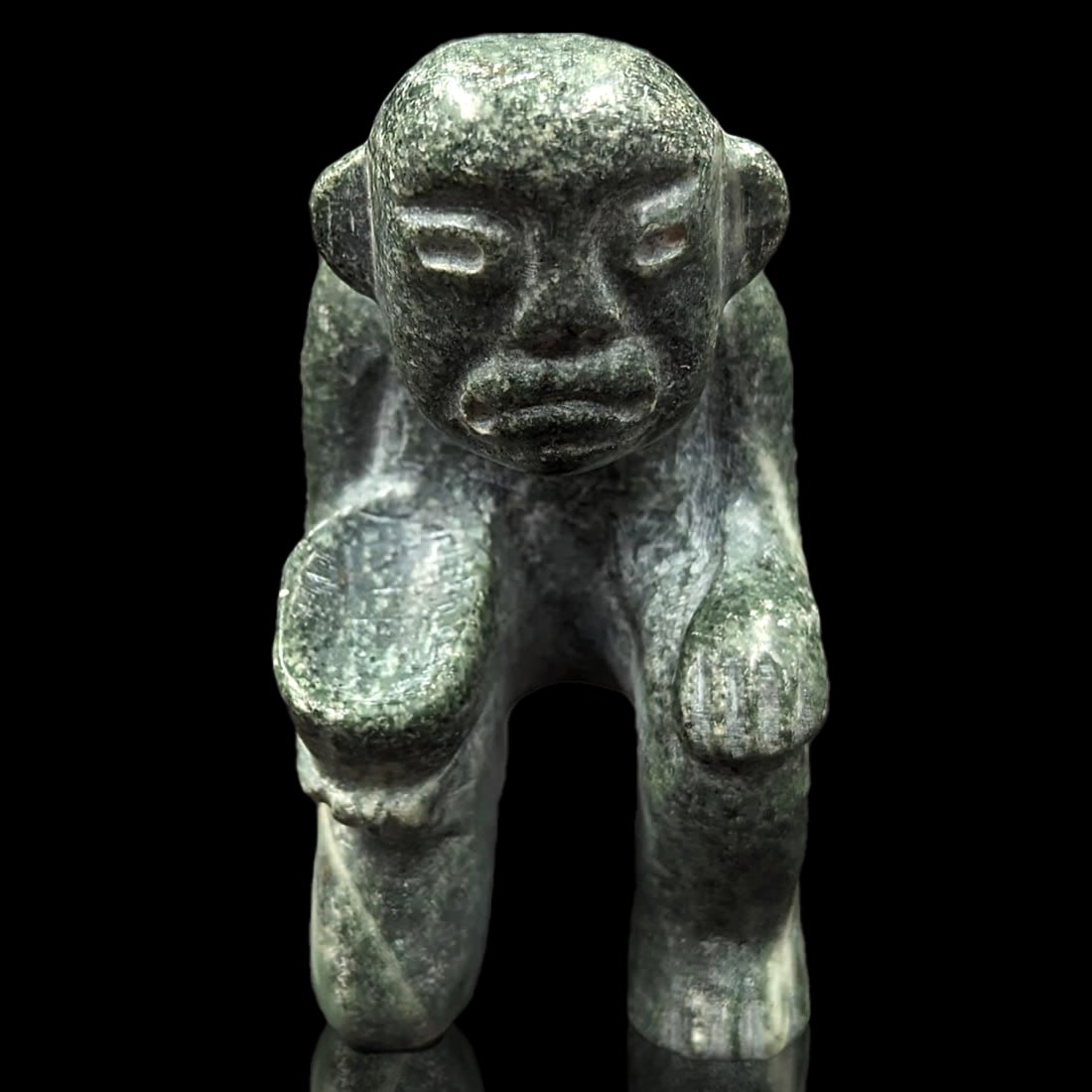 An Olmec Jade Stone Kneeling Figure (1 of 8)