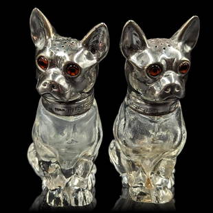 Pair Of Vintage Dog Salt And Pepper Shakers With Sterling Silver Heads: **DUE TO THIS LOT BEING SILVER IT MUST BE PAID VIA BANK WIRE TRANSFER OR CERTIFIED CHECK.** Pair Of Vintage Dog Salt And Pepper Shakers With Sterling Silver Heads. Measures approx. 4" X 3 1/2". || Ple