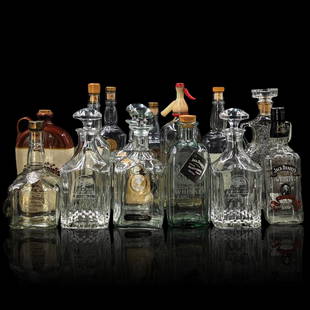 Lot Of 14 Jack Daniels And Country Club Glass Spirit Bottles: Lot Of 14 Jack Daniels Glass Spirit Bottles. // Provenance: PRIVATE ESTATE CENTRAL FLORIDA || Please carefully read our terms of sale, shipping information, and request any condition reports or photos