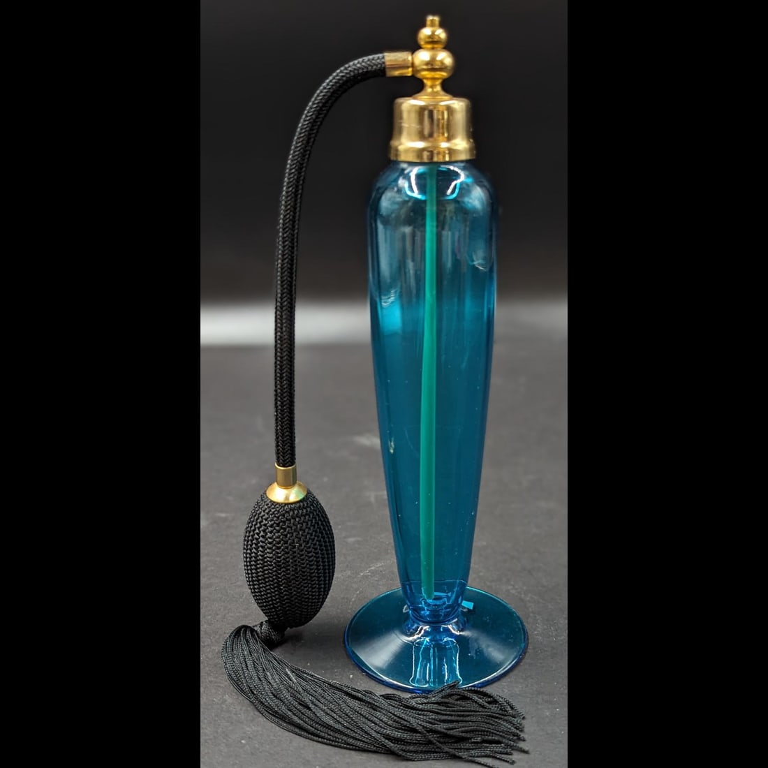 Signed Hand-Blown Steuben Celeste Blue Perfume Atomizer, Trefoil Acid Mark In Pontil Area: Signed Hand-Blown Steuben Celeste Blue Perfume Atomizer, Trefoil Acid Mark In Pontil Area. Measures approx. 8" tall. || Please carefully read our terms of sale, shipping information, and request any c
