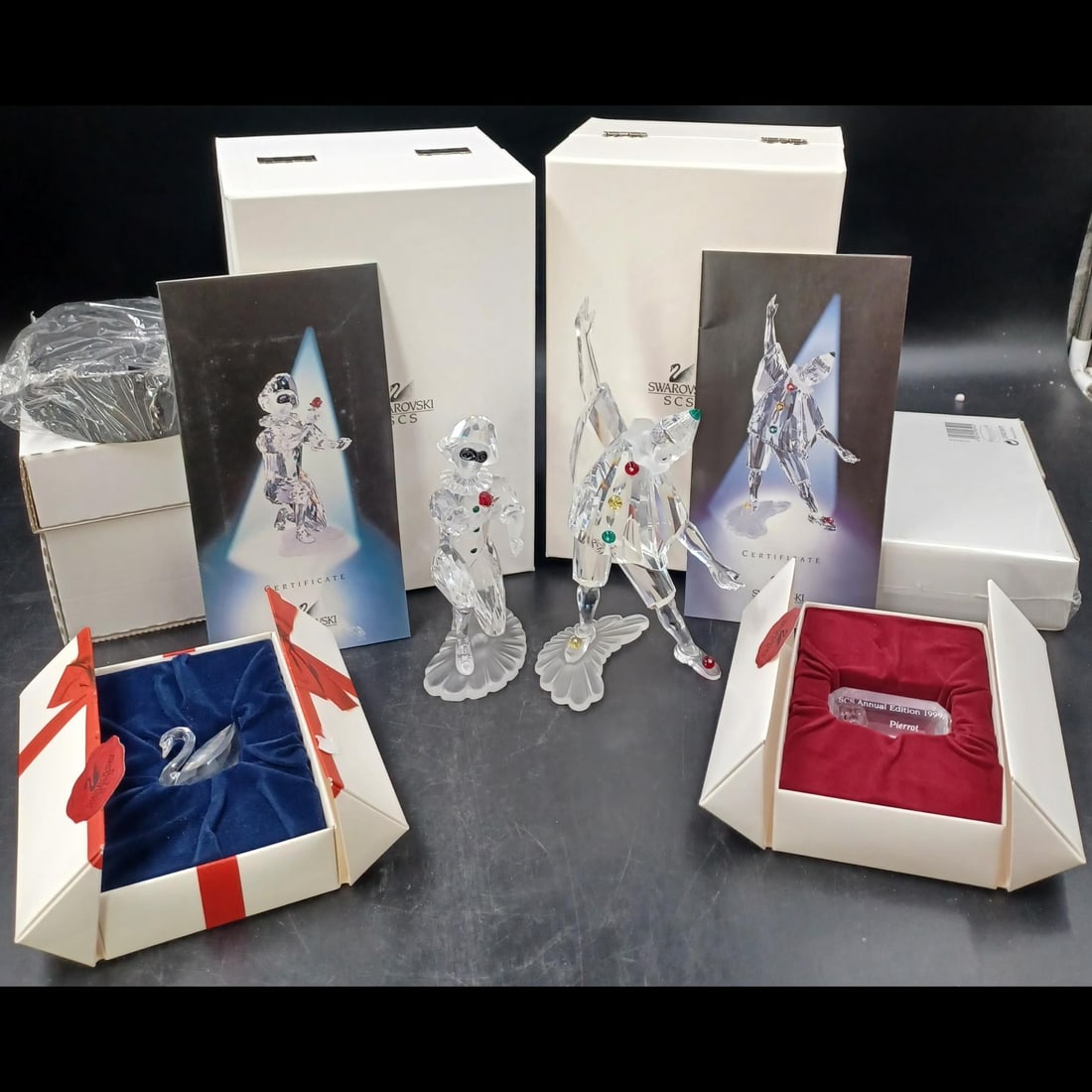 Pair Of Swarovski SCS Masquerade "Pierrot" + "Harlequin" With Cases, Plaques, Stands, Gifts, & COA: Pair Of Swarovski SCS Masquerade "Pierrot" + "Harlequin" With Cases, Plaques, Stands, Gifts, & COA. Each figurine contains original case, plaque, stand, & COA + an extra gift. ((8 TOTAL BOXES)) || Ple