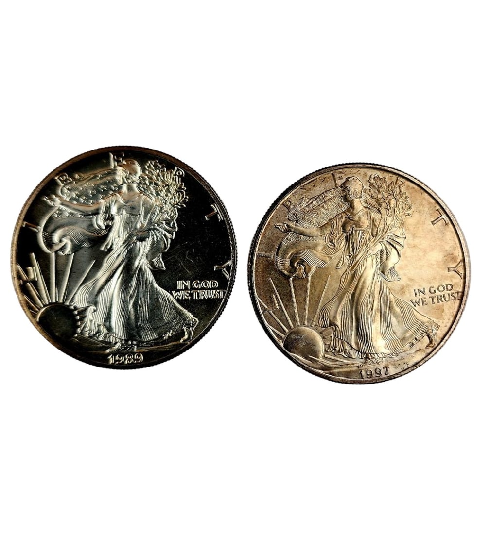 1997 & 1989 American Silver Dollar, 1989 Seems Brilliant And Almost Uncirculated: (ITEM MUST BE PAID WITH CASH OR BANK WIRE ONLY) 1997 & 1989 American Silver Dollar, 1989 Seems Brilliant And Almost Uncirculated.// Provenance: PRIVATE ESTATE CENTRAL FLORIDA. || >>>RBFineArts CFL Inc