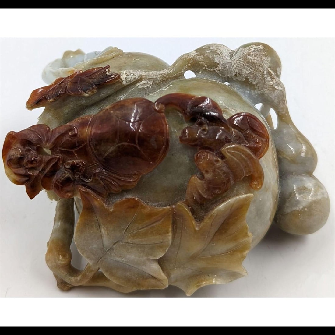 Finely Carved Jade Sculpture With Sun Mark: Finely Carved Jade Sculpture With Sun Mark. Measures 4" X 3". Please copy and paste the URL link below to review our Terms and Conditions for bidding, payment, shipping and other specifics f