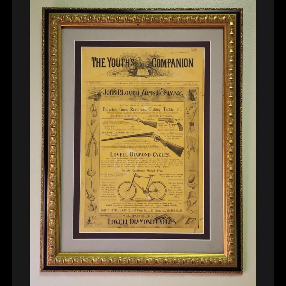 Framed Advertisement The Youth Companion John P Lovell Arms Company: Framed Advertisement The Youth Companion John P Lovell Arms Company. Frame Measure 21.5" X 16.5". // Provenance: PRIVATE ESTATE CENTRAL FLORIDA Please copy and paste the URL link below to re