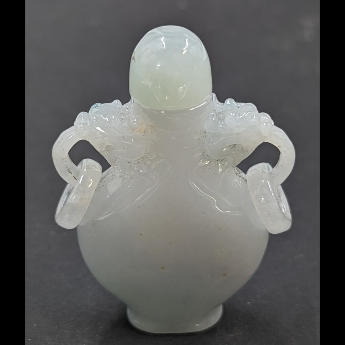 A Finely Carved Chinese Jade Snuff Bottle With A Twist Top (1 of 8)
