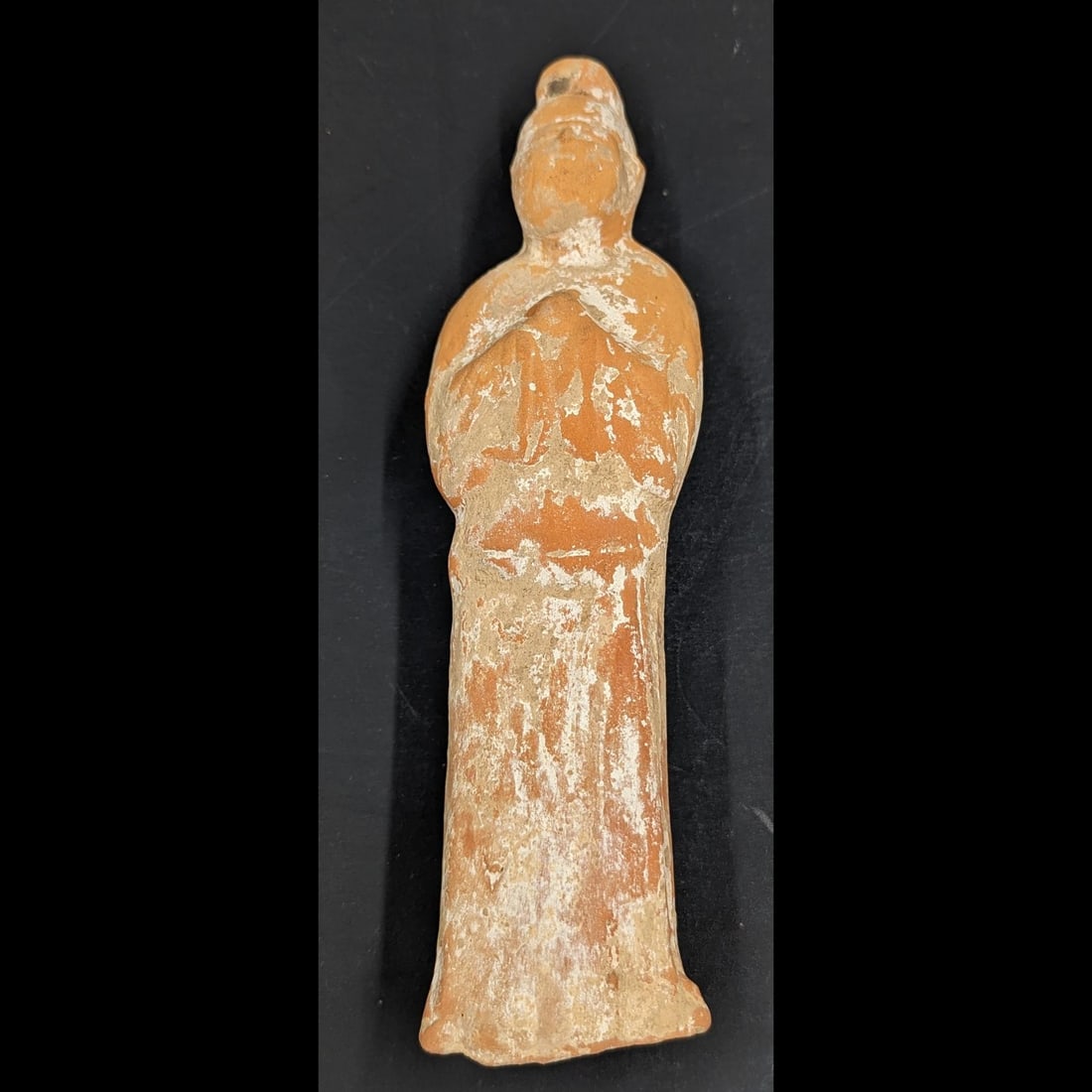 Chinese Han Dynasty Terracotta Figure: Chinese Han Dynasty Terracotta Figure. Measures approx. 6 1/2" tall. Please copy and paste the URL link below to review our Terms and Conditions for bidding, payment, shipping and other speci