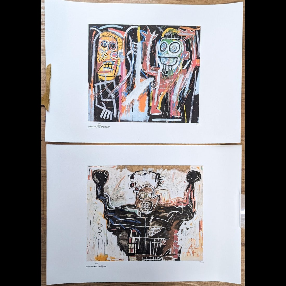 Pair Of Limited Ed. 34/100 And 83/100 Jean Michel Basquiat Lithographs: Pair Of Limited Ed. 34/100 And 83/100 Jean Michel Basquiat Lithographs. Measures approx. 27 1/2" X 19 1/2" each. Please copy and paste the URL link below to review our Terms and Conditions fo