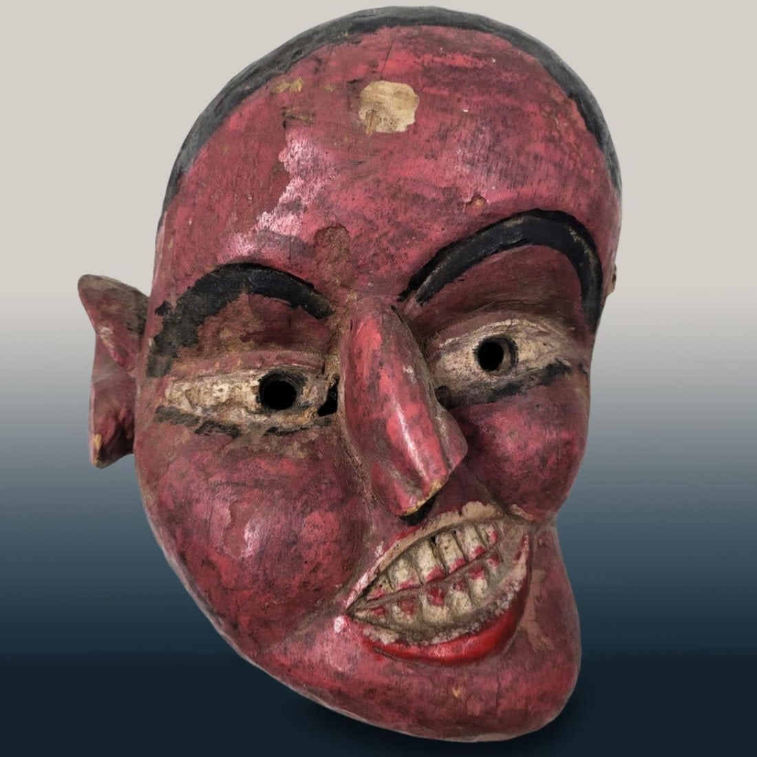 Antique “Twister” Mask. Tharu People, Nepal.: Antique “Twister” Mask. Tharu People, Nepal. The Tharu are devout Hindus, globally renowned for their skill as mask-carvers. Kenya/northern Tanzania. Twentieth Century. Measures approx. 12" X 