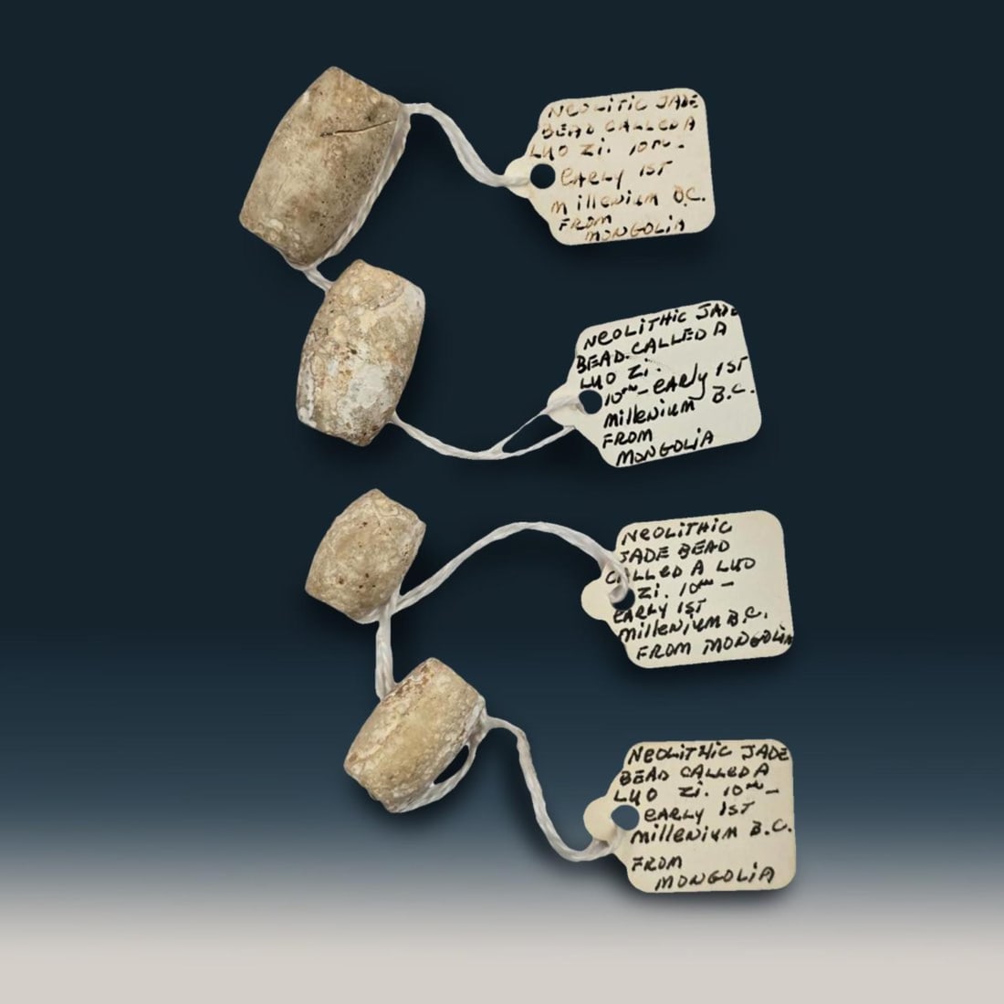Lot Of 4 Luo Zi Neolithic Jade Beads 10th - Early 1st Millenium B.C Mongolia: Lot Of 4 Luo Zi Neolithic Jade Beads 10th - Early 1st Millenium B.C Mongolia. Measure 3/4" To 1 1/8". Provenance: Estate of Kay Dacko. Kay was a long-time collector and seller of antiques / collectabl