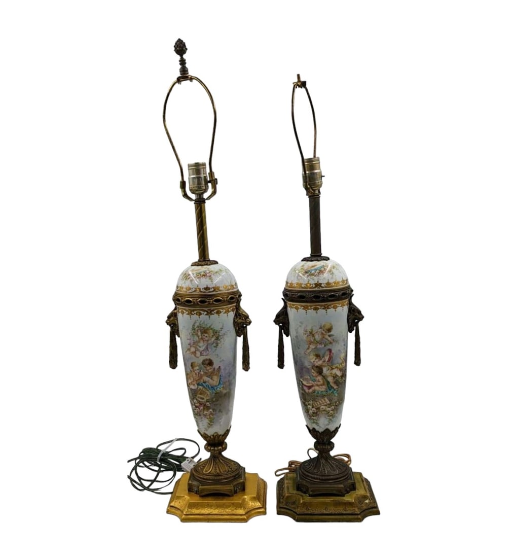 Pair Of Antique French Sevres Porcelain On Bronze Lamps: Pair Of Antique French Sevres Porcelain On Bronze Lamps. Measures approx. 30" and 33" Tall. Provenance; One Person Private Estate Central Florida. Please copy and paste the URL link below to
