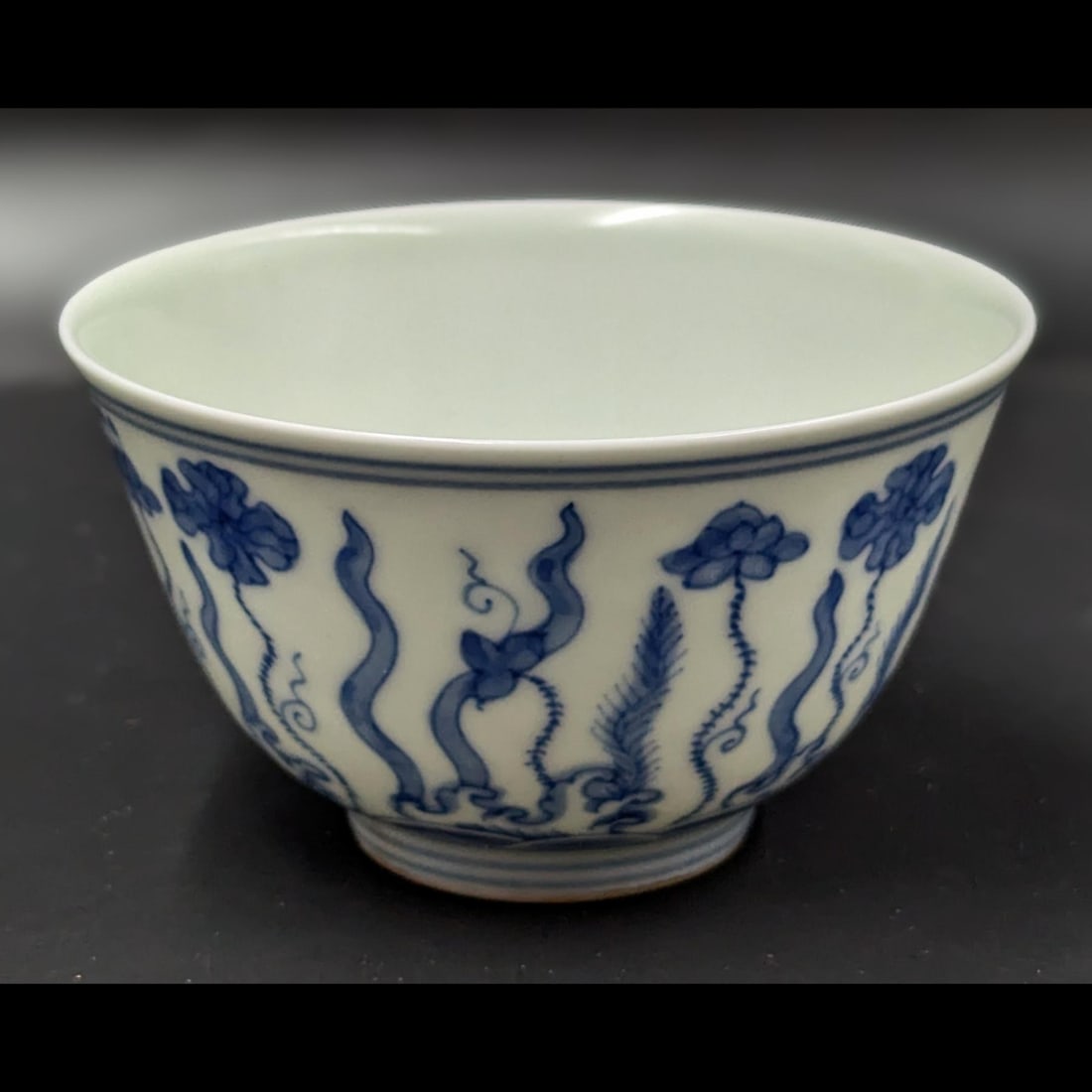 Chinese Blue And White Porcelain Tea Cup With Xuande Mark: Chinese Blue And White Porcelain Tea Cup With Xuande Mark. Measures approx. 2" X 3 1/2". Please copy and paste the URL link below to review our Terms and Conditions for bidding, payment, sh