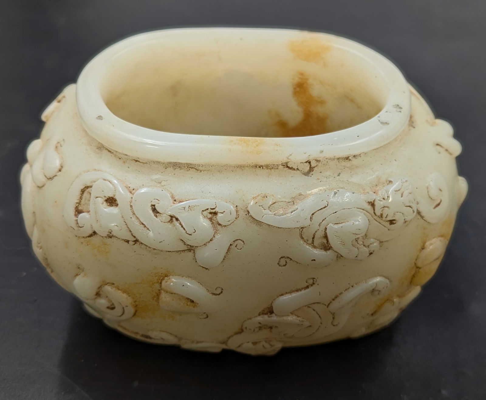 Finely Carved Chinese White Jade Bowl With Intricate Design: Finely Carved Chinese White Jade Bowl With Intricate Design. Measures approx. 3" X 5". Please copy and paste the URL link below to review our Terms and Conditions for bidding, payment, shippi