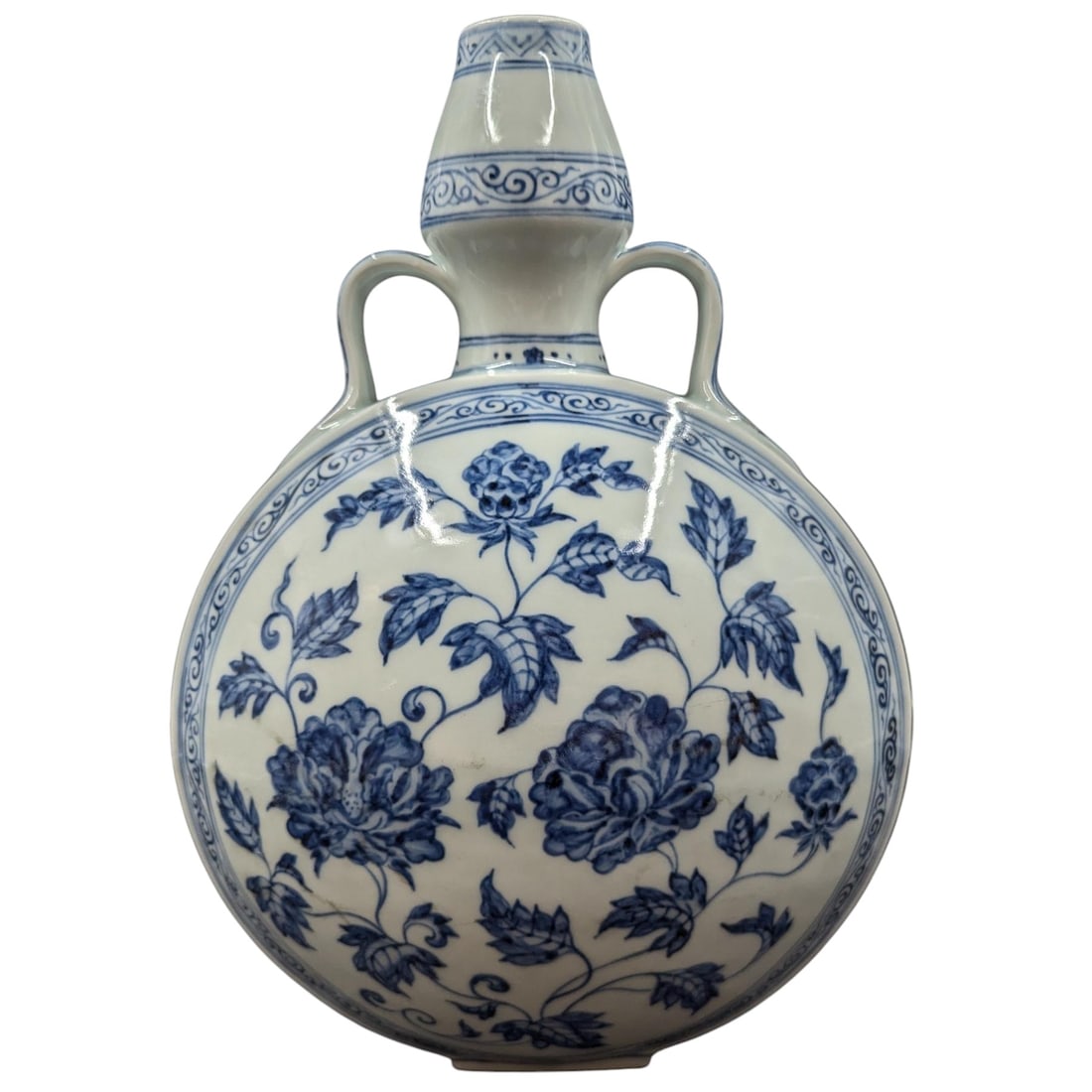 Chinese Blue And White Floral Porcelain Moon Flask Vase: Chinese Blue And White Floral Porcelain Moon Flask Vase. Measures approx. 12" X 8". Please copy and paste the URL link below to review our Terms and Conditions for bidding, payment, shipping