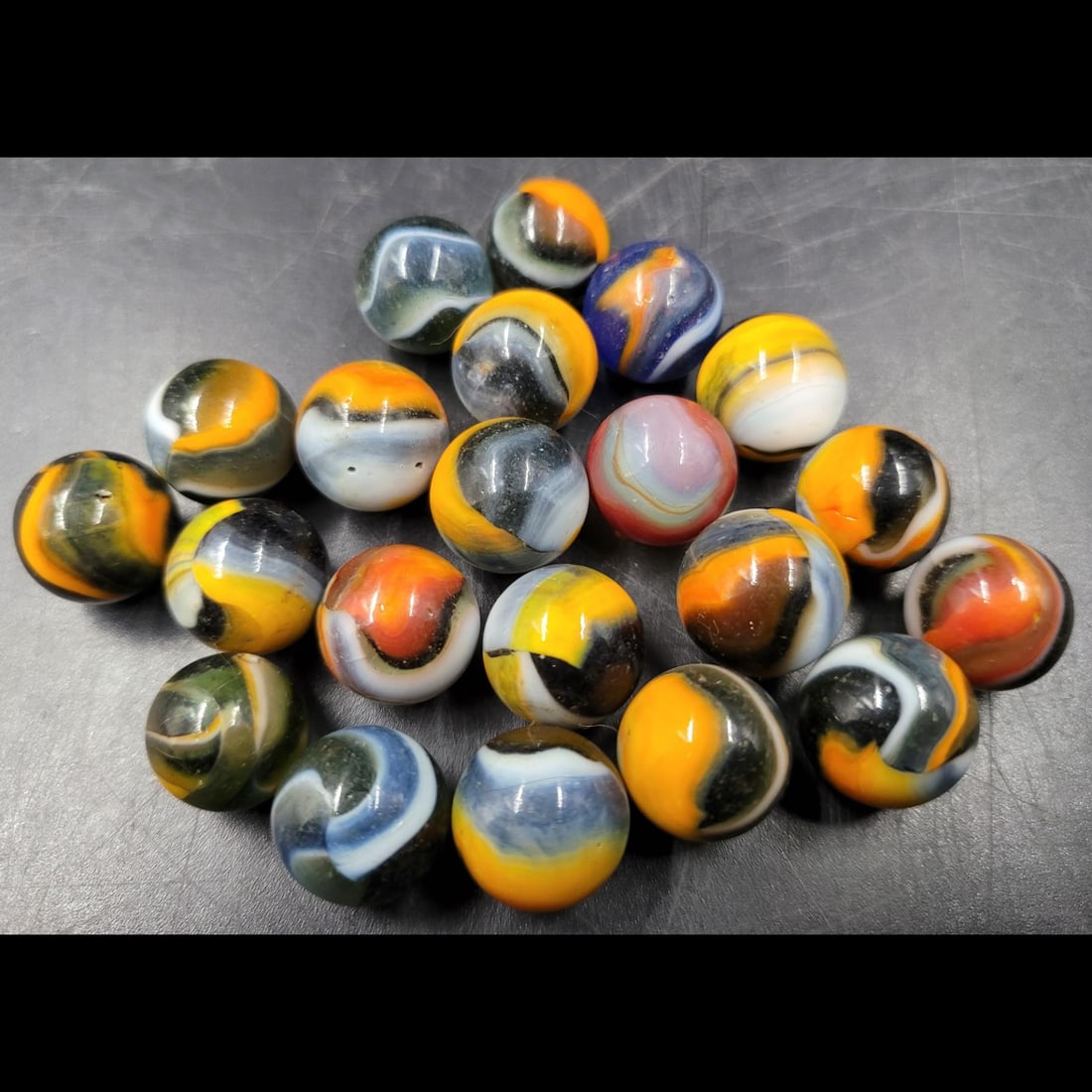 Peltier National Glass Company Marbles: Peltier National Glass Company Marbles. Please copy and paste the URL link below to review our Terms and Conditions for bidding, payment, shipping and other specifics for the auction compan