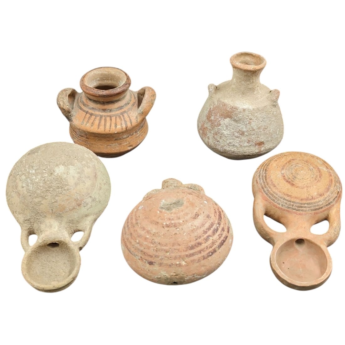 Estate Lot Of 5 Cyprotic Terracotta Vessels, Two Jars And Three Flasks: Estate Lot Of 5 Cyprotic Terracotta Vessels, Two Jars And Three Flasks. Measures approx. from 11cm to 20cm. Please copy and paste the URL link below to review our Terms and Conditions for bid