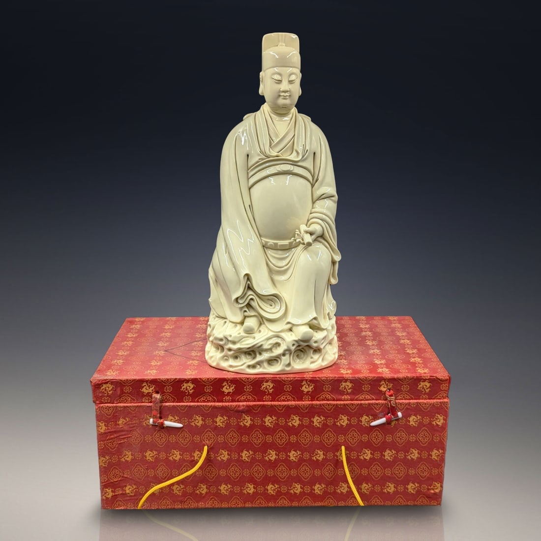 Large Chinese Blanc De Chine Duhua Scholar Statue With Case: Large Chinese Blanc De Chine Duhua Scholar Statue With Case. Measures approx. 15 1/2" X 6 1/2". Please copy and paste the URL link below to review our Terms and Conditions for bidding, paymen