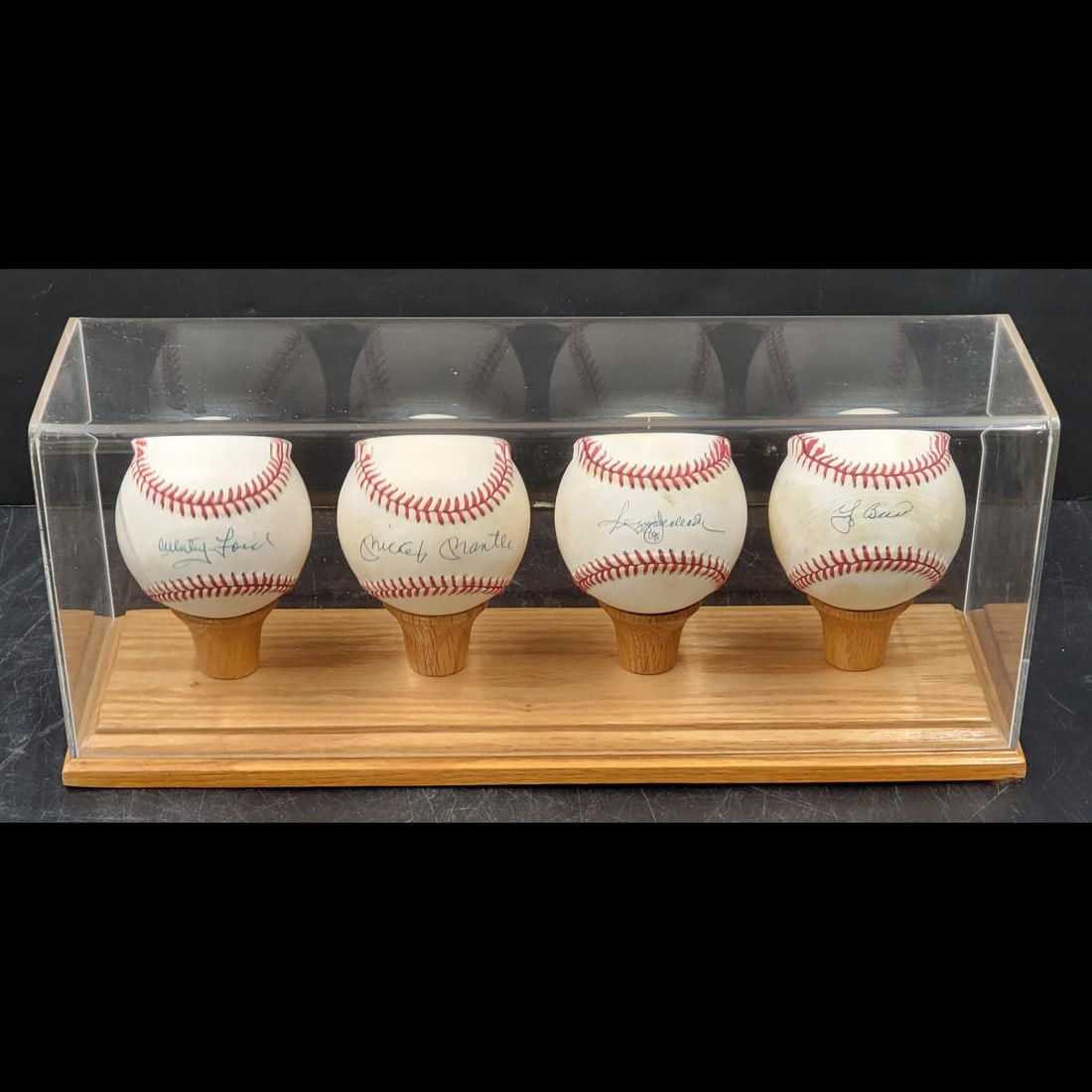 Signed MLB Baseballs: Mickey Mantle, Reggie Jackson, Yogi Berra, Whitney Ford (1 of 13)