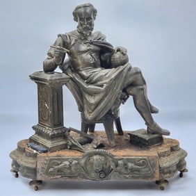 An Unsigned Mounted Spelter Sculpture Of A Scholar