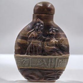 A Finely Carved Jasper Snuff Bottle