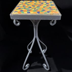 A Colorful Tile Top Wrought Iron Stand