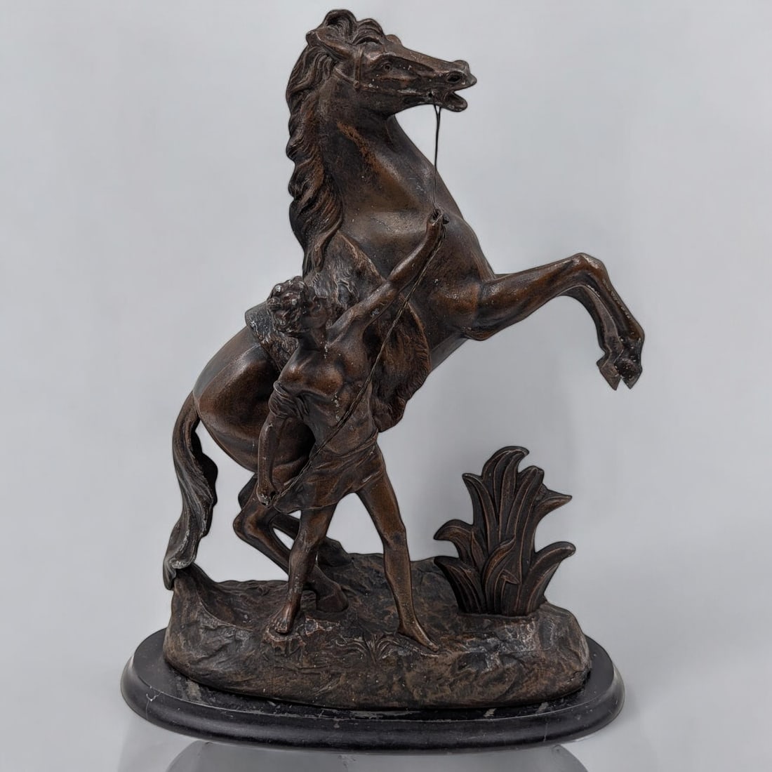 A Fine Vintage Spelter Sculpture In The Style Of The Marly Horses by Guillaume Coustou: A Fine Vintage Spelter Sculpture In The Style Of The Marly Horses by Guillaume Coustou. Measures approx. 16 1/2" X 12". Please note that there is some areas of wear and weathering, please see pics.