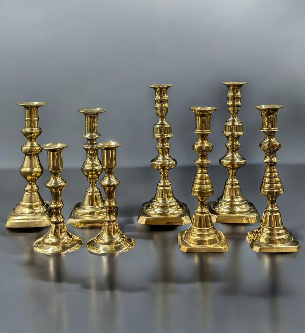 Set Of 8 Old Victorian Gilt Brass Candlestick Holders: Set Of 8 Old Victorian Gilt Brass Candlestick Holders. Measures approx. from 6" to 9" tall. Provenance: Central Florida Collector's Estate whom had lived in Japan for many years. Please copy