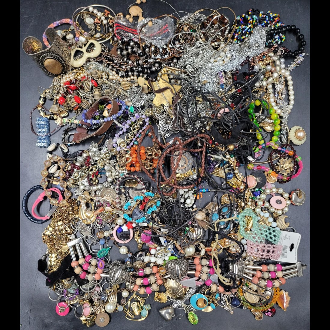 Large Lot Of Costume Jewelry, Necklaces, Bracelets, And Earrings: **DUE TO THIS LOT BEING JEWELRY IT MUST BE PAID VIA BANK WIRE TRANSFER OR CERTIFIED CHECK.** Large Lot Of Costume Jewelry, Necklaces, Bracelets, And Earrings. Please copy and paste t