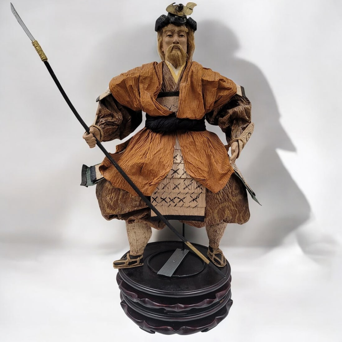 Vintage Japanese Washi Paper Mache And Wood Daimyo Samurai Figurine On Stand: Vintage Japanese Washi Paper Mache And Wood Daimyo Samurai Figurine On Stand. Measures approx. 22 1/2" X 12". Provenance: Central Florida Collector's Estate whom had traveled all over the world, purch