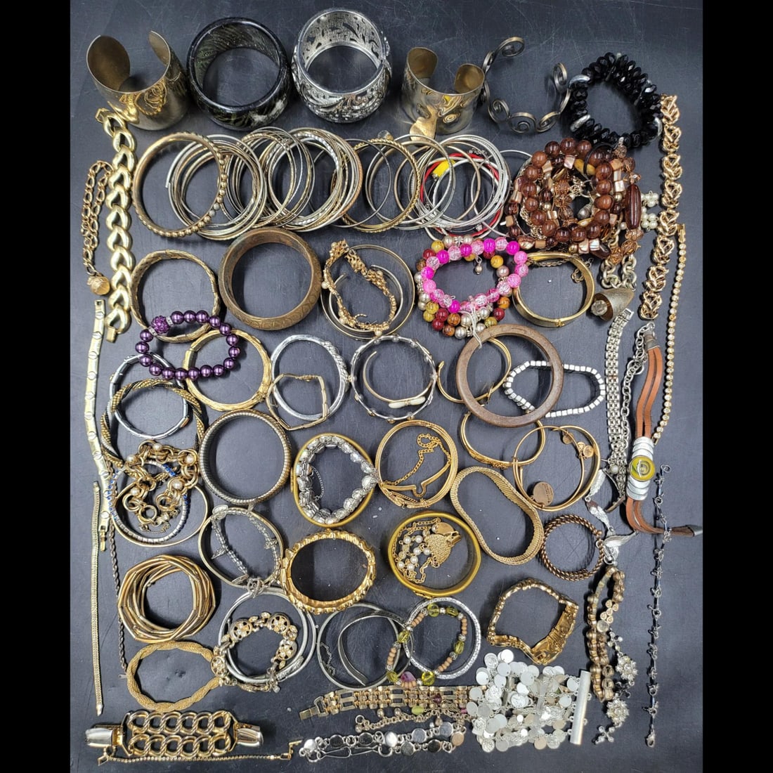 Lot Of Costume Jewelry Bracelets: **DUE TO THIS LOT BEING JEWELRY IT MUST BE PAID VIA BANK WIRE TRANSFER OR CERTIFIED CHECK.** Lot Of Costume Jewelry Bracelets. Please copy and paste the URL link below to review our
