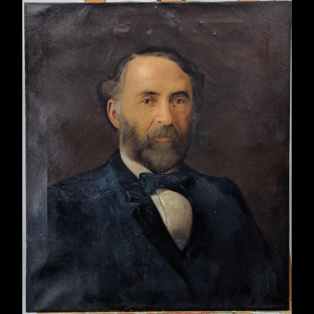 An Early American School Oil On Canvas Portrait Painting: An Early American School Oil On Canvas Portrait Painting. Measures approx. 25 1/2" X 21 1/2". Please copy and paste the URL link below to review our Terms and Conditions for bidding, payment,