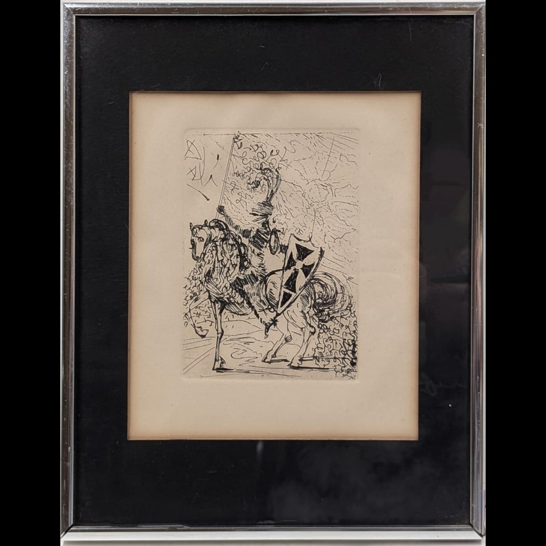 "El Cid" Etching by Salvador Dali With COA: "El Cid" Etching by Salvador Dali With COA. Measures approx. 14" X 11", Sight measures approx. 9 1/2" X 7 1/2". Please copy and paste the URL link below to review our Terms and Conditions for