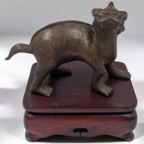 An Early Chinese Bronze Feng Shui Qilin On A Wooden Stand