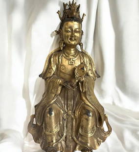 A Gilded Bronze Seated Buddha / Gilt Bronze Figure: A Gilded Bronze Seated Buddha / Gilt Bronze Figure. Measure 11.5" X 8". Please copy and paste the URL link below to review our Terms and Conditions for bidding, payment, shipping and other s