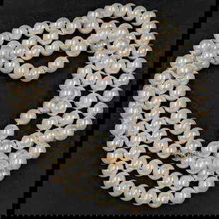 Large 60" South Sea Pearl Necklace With 18K Gold Clasp, 11MM, 123 Pearls Total: **DUE TO THIS LOT BEING JEWELRY IT MUST BE PAID VIA BANK WIRE TRANSFER OR CERTIFIED CHECK.** Large 60" South Sea Pearl Necklace With 18K Gold Clasp, 11MM, 123 Pearls Total. Measures 60" unclasped.