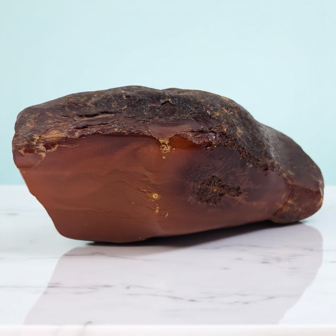Large Chunk Of Natural Baltic Amber, 117 Grams: Large Chunk Of Natural Baltic Amber, 117 Grams. Measures approx. 1 1/2" X 3 1/4". Please copy and paste the URL link below to review our Terms and Conditions for bidding, payment, shipping a