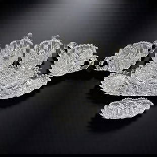 Group Of ABP Cut Glass Cups & Pair Of Trays, 6 Pieces: Group Of ABP Cut Glass Cups & Pair Of Trays, 6 Pieces. Trays each measure approximately 11-1/2" and 4-3/4" long, (2) cups measure approximately 3" tall x 6" and (2) cups measure approximately 3" tall