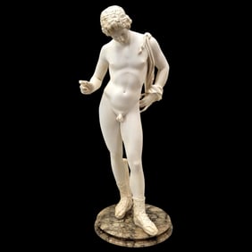 A White Narcissus Statue Mounted On Granite