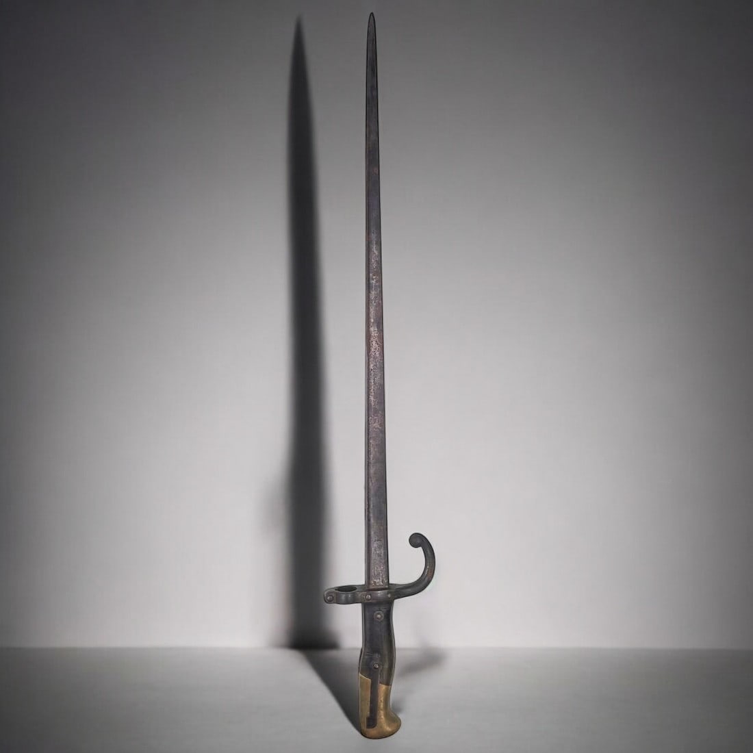 Antique Model 1874 French Bayonet: **DUE TO THIS LOT BEING CLASSED AS A WEAPON IT MUST BE PAID VIA BANK WIRE TRANSFER OR CERTIFIED CHECK.**Antique Model 1874 French Bayonet. Measures approx. 25.25" X 4" Please copy and paste t