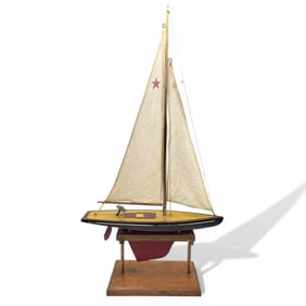 A Fine Wood Carved USA Model Sailboat