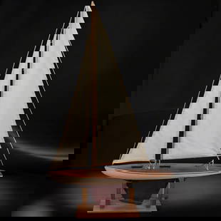 A Fine Vintage Wooden Dumas Ace Sloop Model Sailboat: A Fine Vintage Wooden Dumas Ace Sloop Model Sailboat. Measures approx. 39" X 24". Needs touch-ups. Please copy and paste the URL link below to review our Terms and Conditions for bidding, p