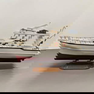 A Fine Vintage Hand Painted Modern Yacht Wooden Model: A Fine Vintage Hand Painted Modern Yacht Wooden Model. Measures approx. 9 1/2" X 16" X 4 1/2. Please copy and paste the URL link below to review our Terms and Conditions for bidding, paymen