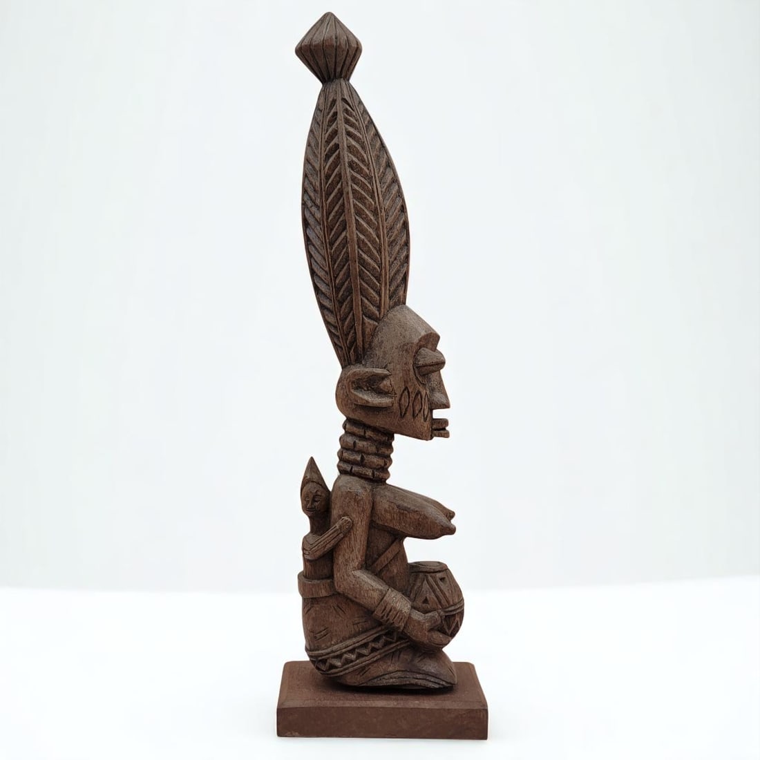 African Nigerian Yoruba River Wood Carved Tribal Sculpture: African Nigerian Yoruba River Wood Carved Tribal Sculpture. Measures approximately 3-1/2" x 5-1/4" x 18-3/4" Please copy and paste the URL link below to review our Terms and Conditions for