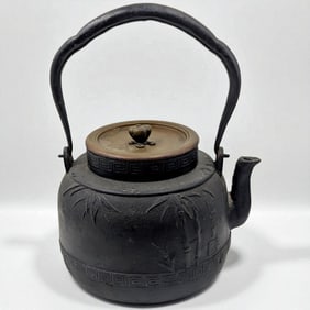 A Japanese Meiji Period Signed Cast Iron Tetsubin With Brass Lid