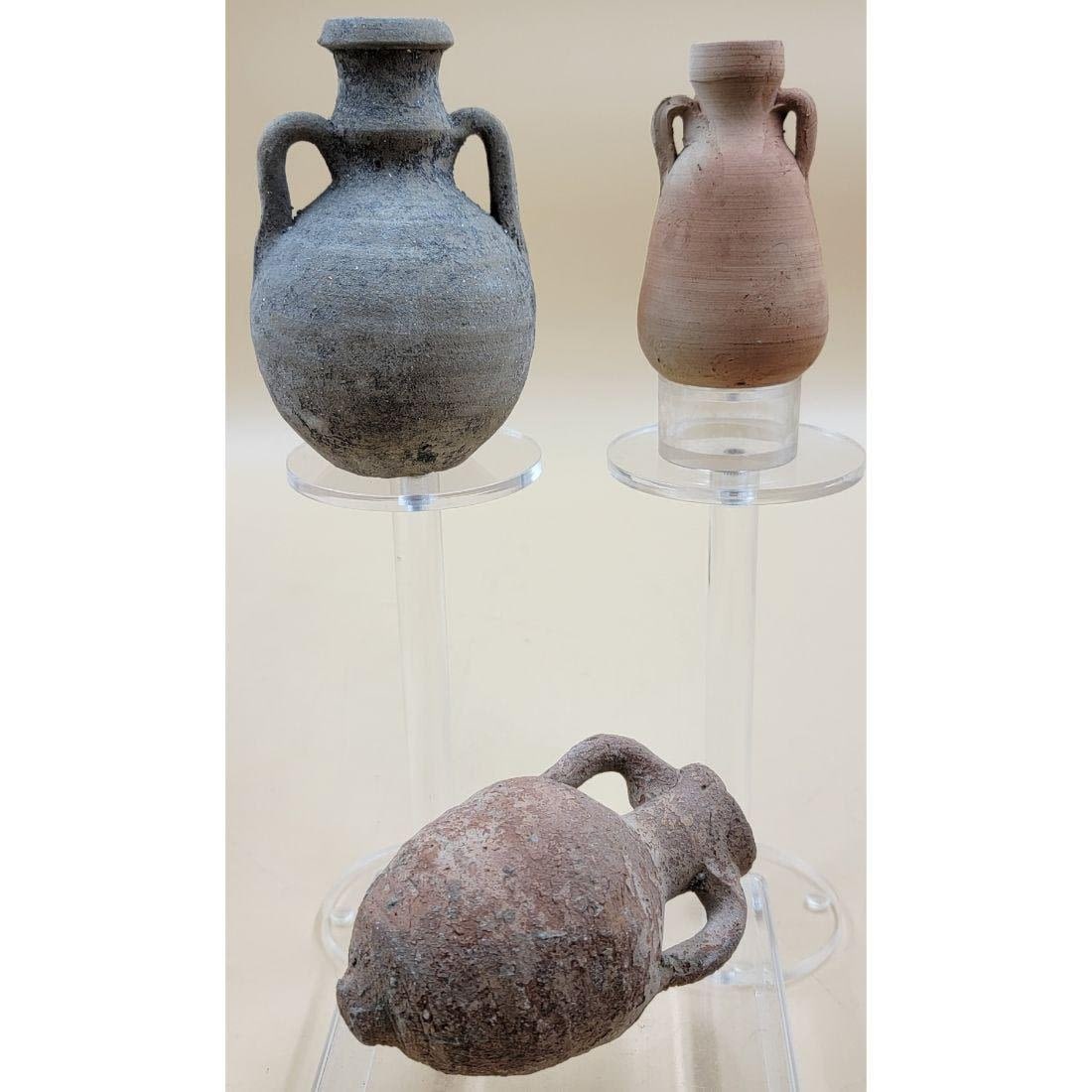 Lot Of 3 Roman Amphora Pottery, One Signed / Modern And Two That Seem To Be Old: Lot Of 3 Roman Amphora Pottery, One Signed / Modern And Two That Seem To Be Old. Measures approx. 3 3/4" To 4 3/4" Tall. Please copy and paste the URL link below to review our Terms and Co