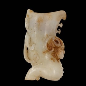 A Carved Chinese White And Russet Jade Mythical Creature Sculpture